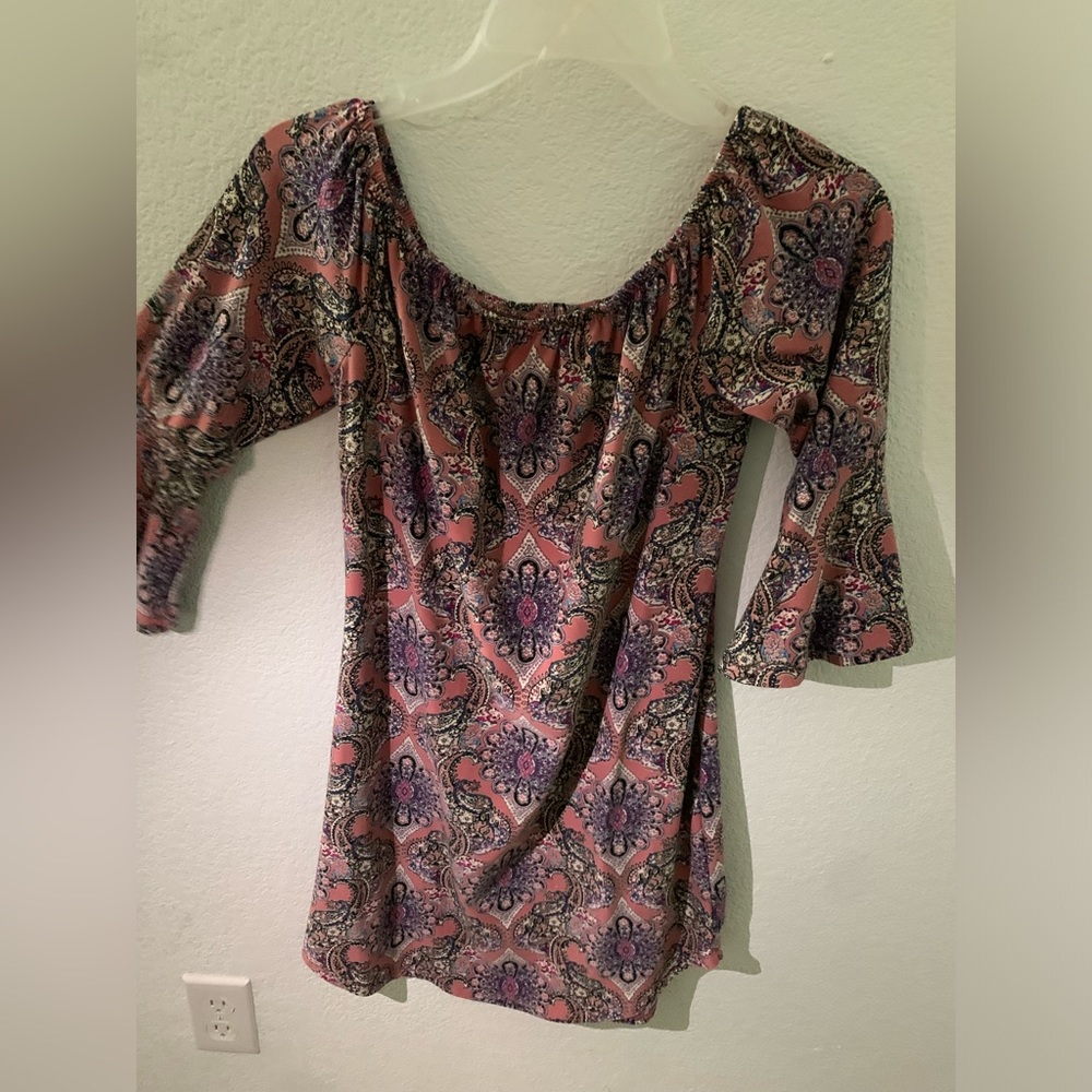 This is a mini dress to be worn with shorts or leggings under